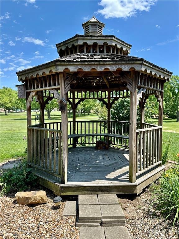 917 Country Club Dr, Butler, MO 64730 - view of community with a gazebo, a lawn, and a deck