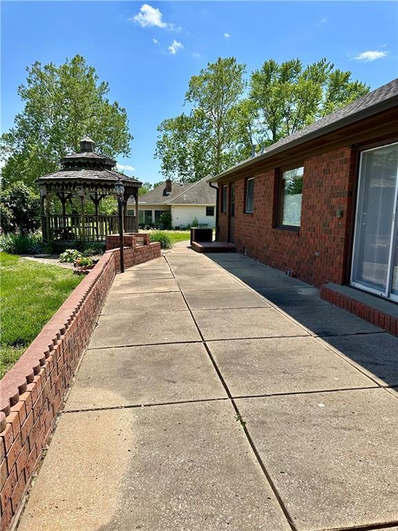 917 Country Club Dr, Butler, MO 64730 - view of patio / terrace with a gazebo