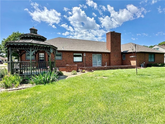 917 Country Club Dr, Butler, MO 64730 - rear view of property with a lawn, a gazebo, a chimney, and brick siding