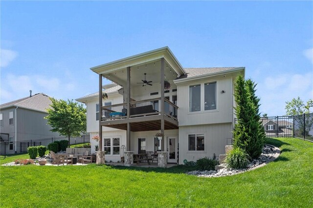 1108 NE Goshen Ct, Lees Summit, MO 64064 - rear view of property with a ceiling fan, a balcony, a patio area, and an outdoor hangout area