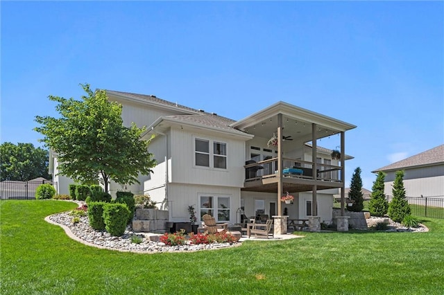 1108 NE Goshen Ct, Lees Summit, MO 64064 - rear view of property with a balcony, ceiling fan, and a patio area