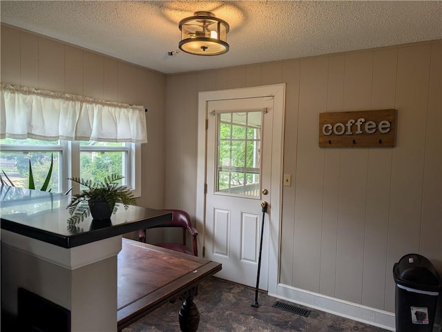 117 W N St, Warrensburg, MO 64093 - dining area with a textured ceiling