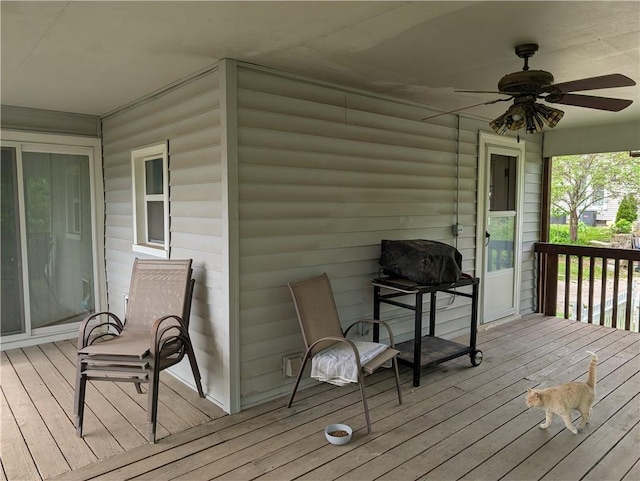 117 W N St, Warrensburg, MO 64093 - deck with a ceiling fan