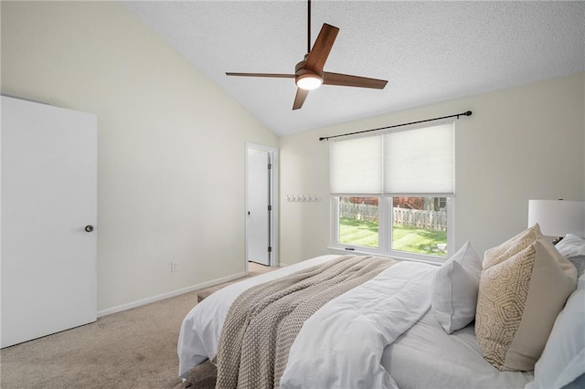 7243 Rene St, Shawnee, KS 66216 - bedroom featuring carpet floors, vaulted ceiling, a ceiling fan, a textured ceiling, and baseboards