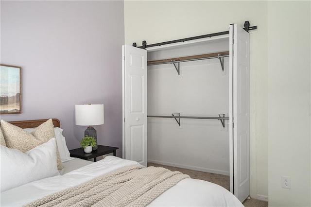 7243 Rene St, Shawnee, KS 66216 - carpeted bedroom with a closet and baseboards