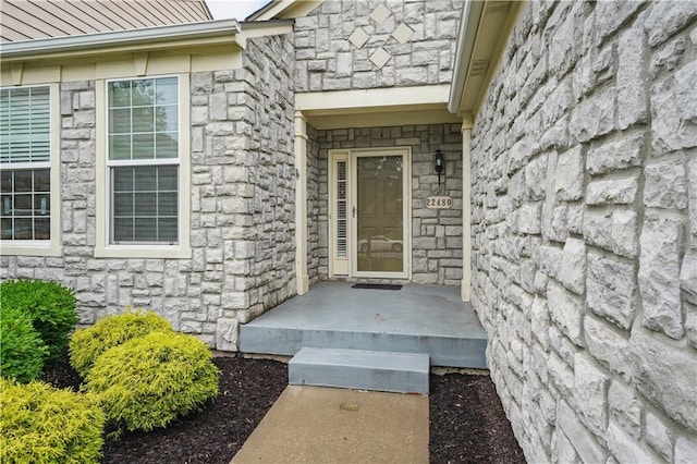 22480 W 113th St, Olathe, KS 66061 - view of exterior entry with stone siding
