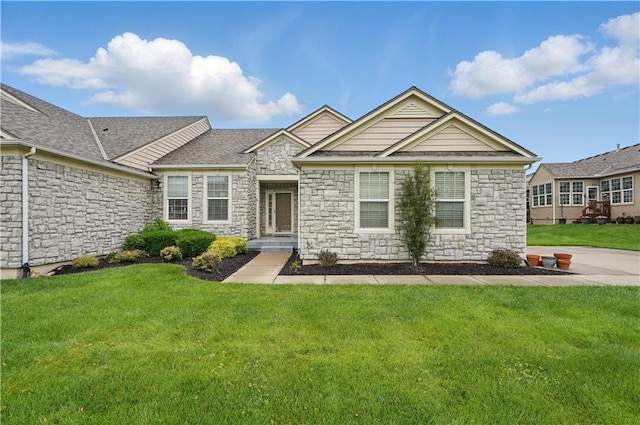 22480 W 113th St, Olathe, KS 66061 - view of front of house featuring stone siding and a front lawn
