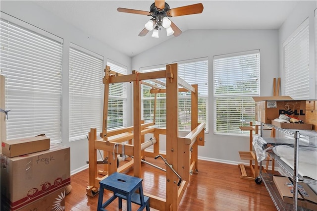 22480 W 113th St, Olathe, KS 66061 - dining area with a ceiling fan, vaulted ceiling, wood-type flooring, and baseboards