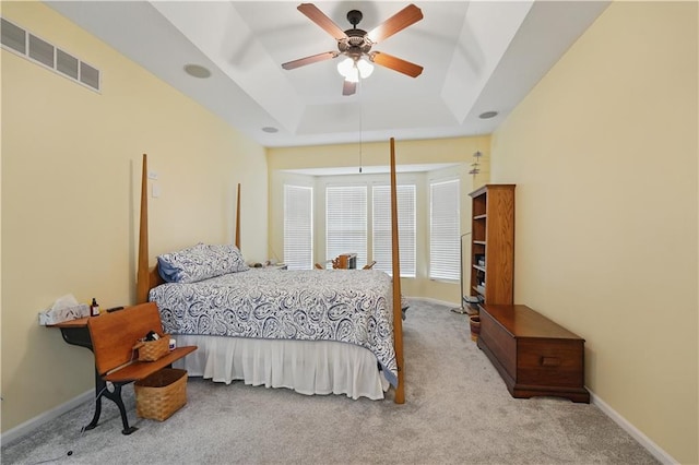 22480 W 113th St, Olathe, KS 66061 - carpeted bedroom featuring a raised ceiling, ceiling fan, and baseboards