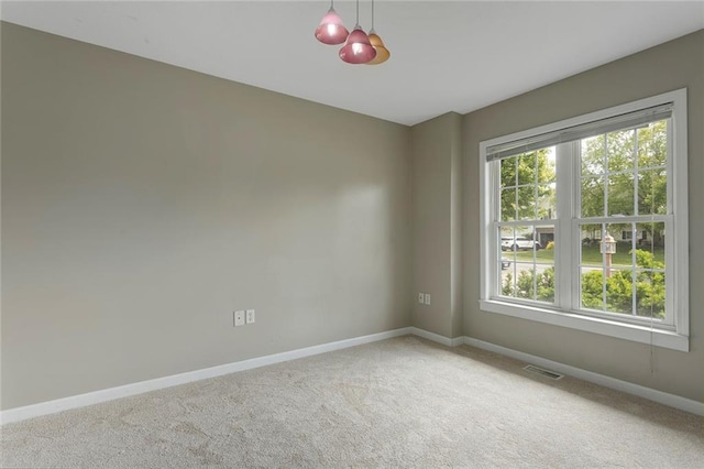 3208 Arbor Lake Dr, Saint Joseph, MO 64506 - unfurnished room featuring carpet floors and baseboards