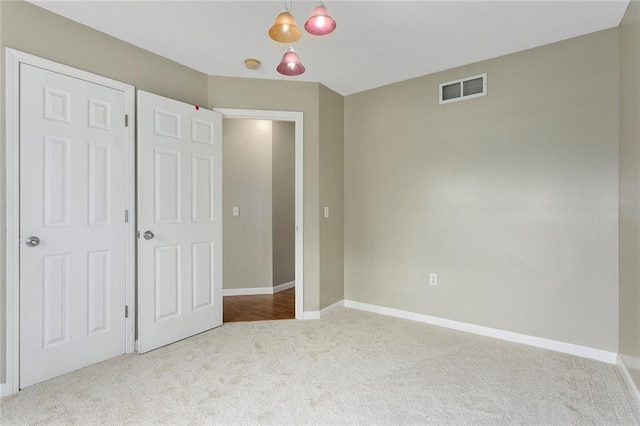 3208 Arbor Lake Dr, Saint Joseph, MO 64506 - unfurnished bedroom featuring carpet floors and baseboards
