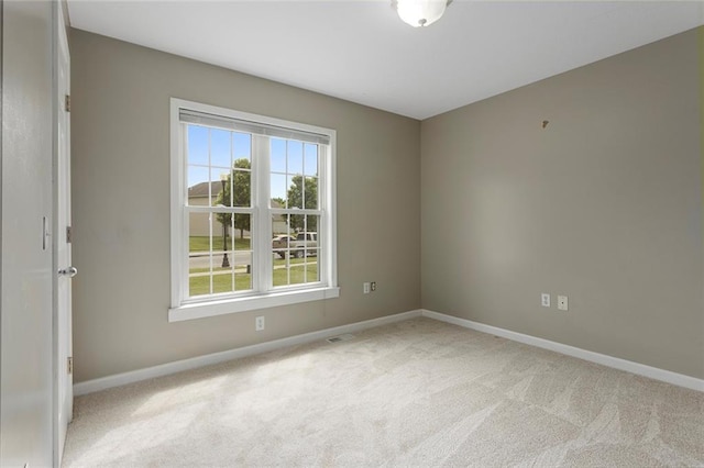 3208 Arbor Lake Dr, Saint Joseph, MO 64506 - empty room with baseboards and carpet