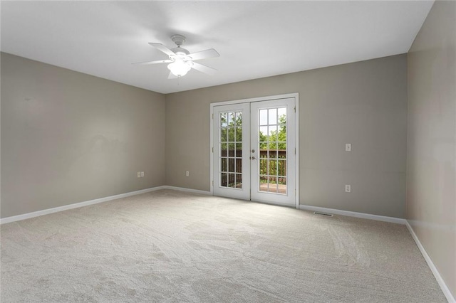 3208 Arbor Lake Dr, Saint Joseph, MO 64506 - empty room featuring baseboards, carpet floors, french doors, and ceiling fan