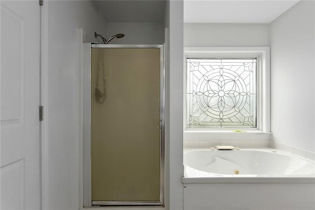 3208 Arbor Lake Dr, Saint Joseph, MO 64506 - full bath with a stall shower and a whirlpool tub