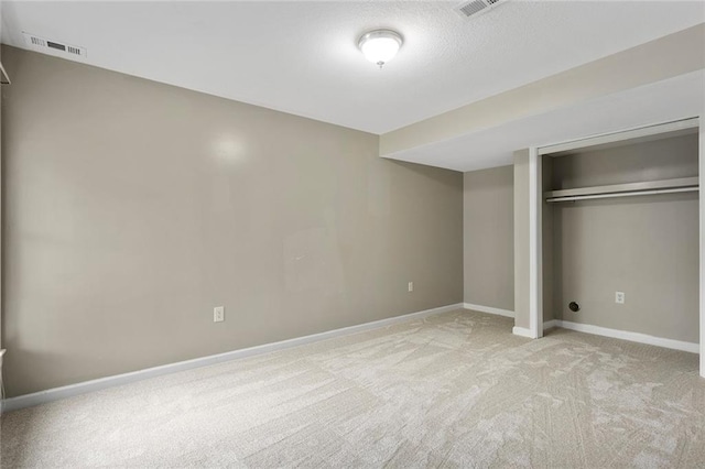3208 Arbor Lake Dr, Saint Joseph, MO 64506 - unfurnished bedroom featuring light carpet, baseboards, and a closet