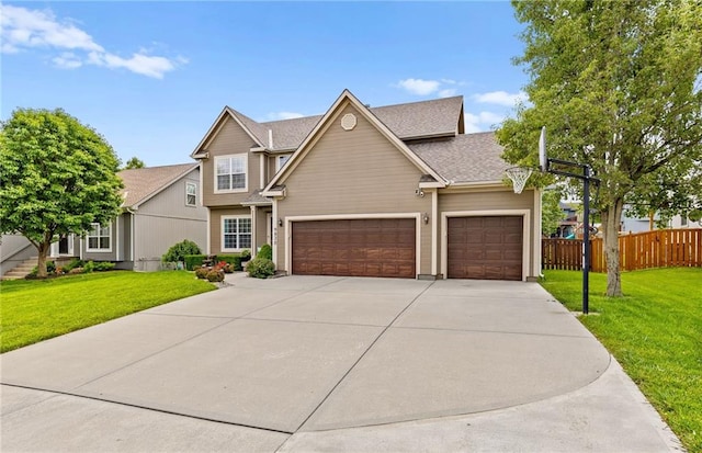 9820 N Donnelly Ave, Kansas City, MO 64157 - view of front of property featuring concrete driveway, an attached garage, and a shingled roof