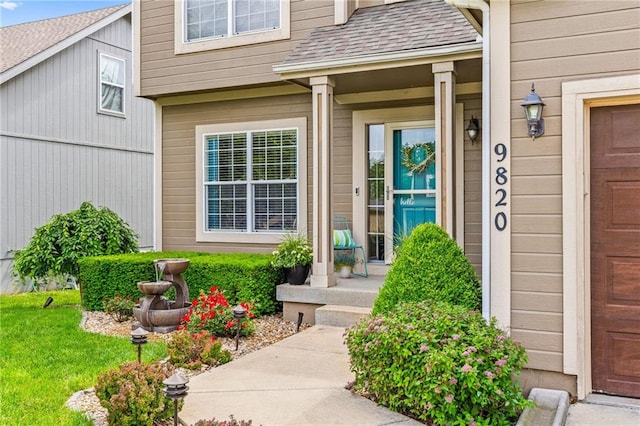 9820 N Donnelly Ave, Kansas City, MO 64157 - doorway to property featuring roof with shingles