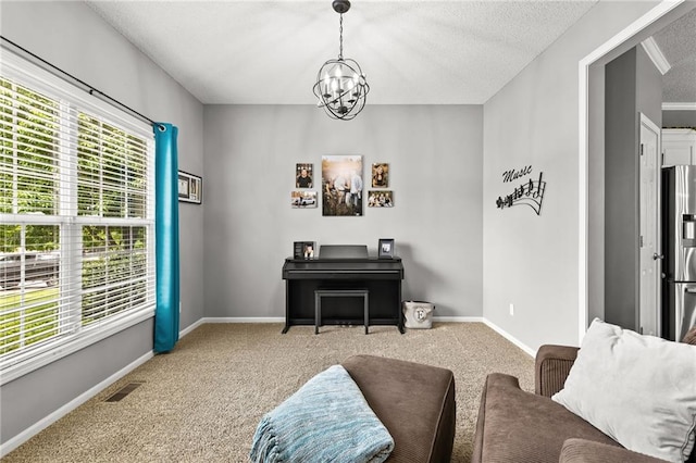 9820 N Donnelly Ave, Kansas City, MO 64157 - sitting room with plenty of natural light, carpet flooring, a chandelier, and a textured ceiling