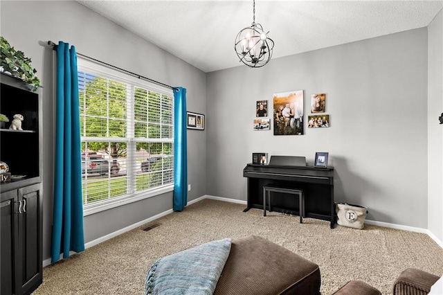9820 N Donnelly Ave, Kansas City, MO 64157 - living area featuring carpet floors, a chandelier, and baseboards