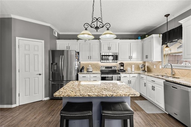 9820 N Donnelly Ave, Kansas City, MO 64157 - kitchen featuring appliances with stainless steel finishes, a sink, white cabinets, dark wood-style floors, and a textured ceiling