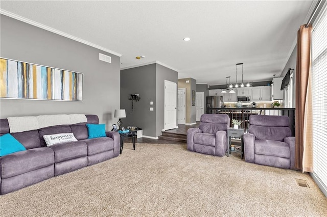 9820 N Donnelly Ave, Kansas City, MO 64157 - living room with crown molding, light carpet, baseboards, and recessed lighting