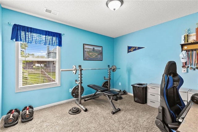 9820 N Donnelly Ave, Kansas City, MO 64157 - exercise room featuring carpet, a textured ceiling, and baseboards