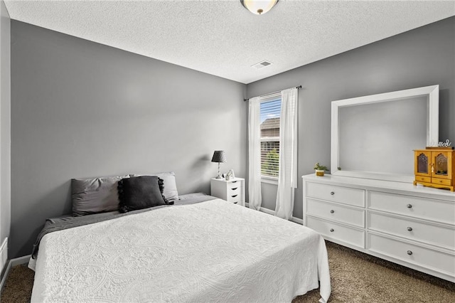 9820 N Donnelly Ave, Kansas City, MO 64157 - bedroom featuring dark colored carpet, a textured ceiling, and baseboards
