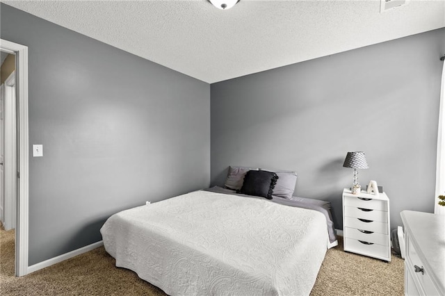 9820 N Donnelly Ave, Kansas City, MO 64157 - bedroom featuring light colored carpet, a textured ceiling, and baseboards