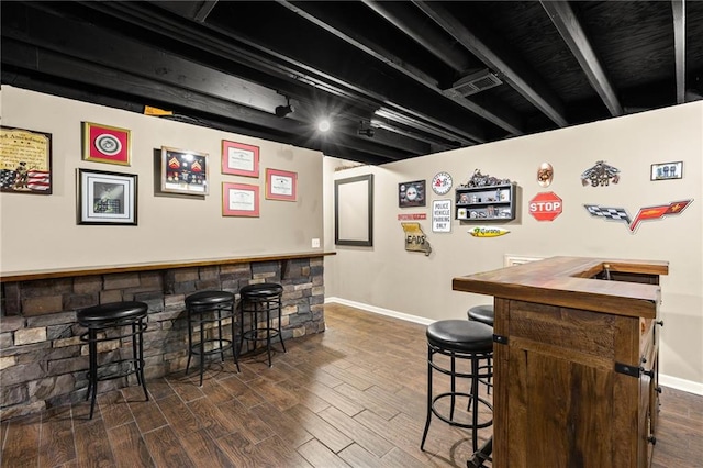 9820 N Donnelly Ave, Kansas City, MO 64157 - indoor dry bar with dark wood-type flooring and baseboards