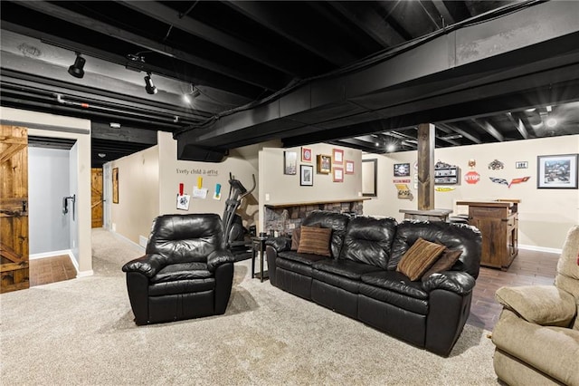 9820 N Donnelly Ave, Kansas City, MO 64157 - living area with a bar, rail lighting, baseboards, and carpet flooring