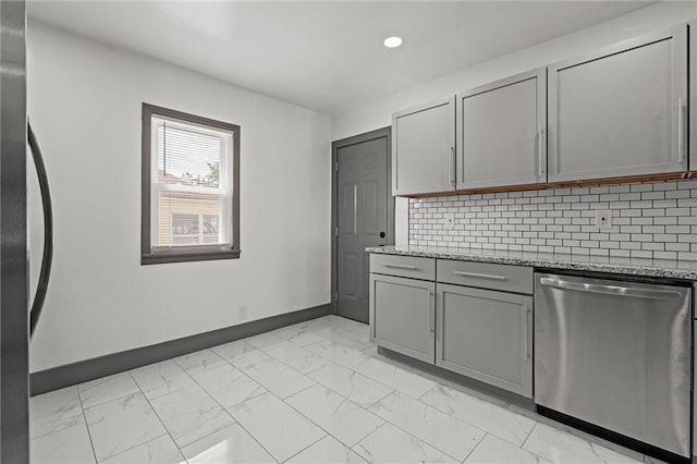 2317 S Maywood Ave, Independence, MO 64052 - kitchen featuring appliances with stainless steel finishes, light marble finish floors, gray cabinetry, recessed lighting, and baseboards