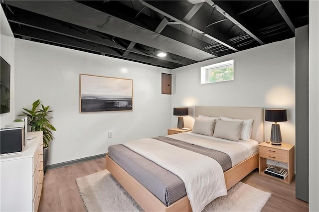 2317 S Maywood Ave, Independence, MO 64052 - bedroom with light wood-type flooring