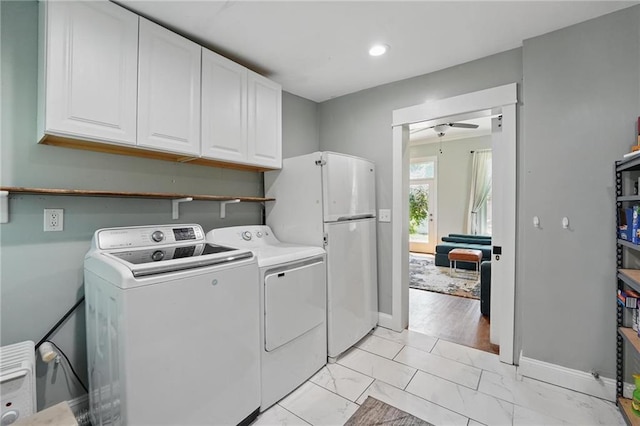 906 E Piankishaw St, Paola, KS 66071 - laundry area with cabinet space, washer and clothes dryer, ceiling fan, baseboards, and recessed lighting