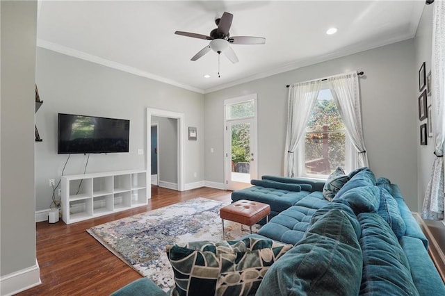 906 E Piankishaw St, Paola, KS 66071 - living area with dark wood finished floors, recessed lighting, a ceiling fan, crown molding, and baseboards