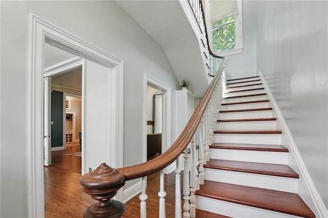 906 E Piankishaw St, Paola, KS 66071 - staircase featuring wood finished floors