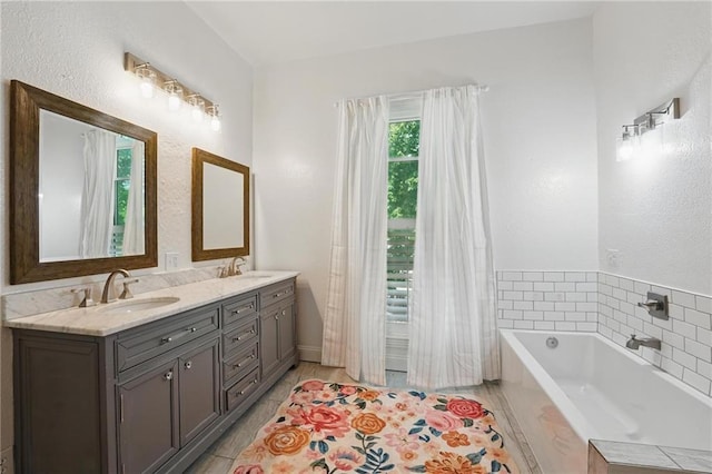 906 E Piankishaw St, Paola, KS 66071 - full bath featuring double vanity and a bath