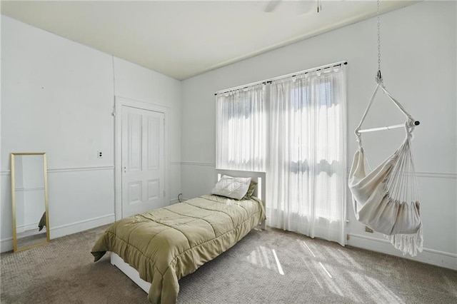 906 E Piankishaw St, Paola, KS 66071 - bedroom with carpet flooring, a closet, and baseboards