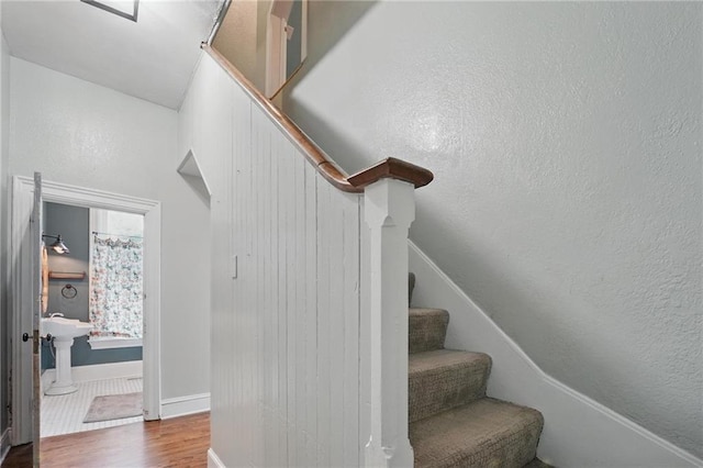 906 E Piankishaw St, Paola, KS 66071 - stairs with wood finished floors and baseboards