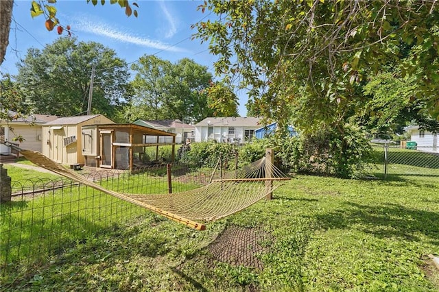 906 E Piankishaw St, Paola, KS 66071 - view of yard featuring exterior structure and an outdoor structure