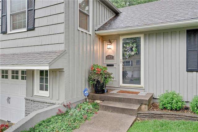 6016 W 85th St, Overland Park, KS 66207 - doorway to property featuring board and batten siding and a shingled roof