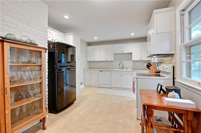 6016 W 85th St, Overland Park, KS 66207 - kitchen featuring white appliances, plenty of natural light, white cabinetry, and recessed lighting
