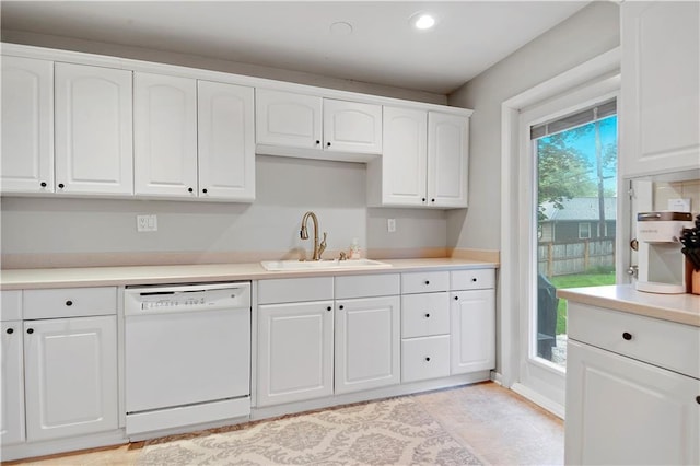 6016 W 85th St, Overland Park, KS 66207 - kitchen with dishwasher, a sink, white cabinetry, light countertops, and recessed lighting
