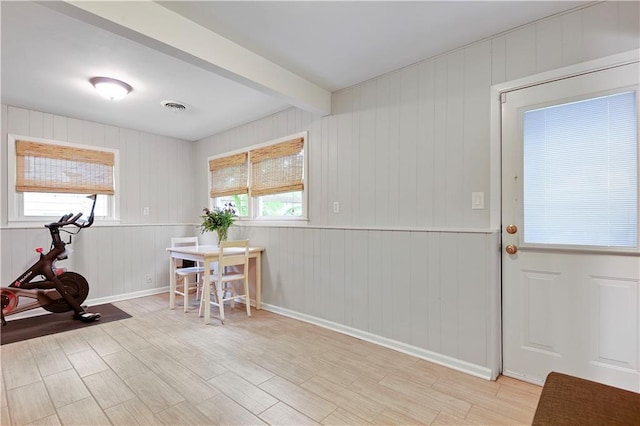 6016 W 85th St, Overland Park, KS 66207 - foyer with plenty of natural light, light wood-style flooring, beam ceiling, and baseboards