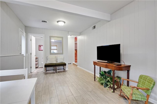 6016 W 85th St, Overland Park, KS 66207 - living area with light wood-style floors and beamed ceiling