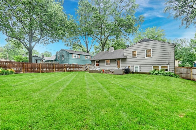 6016 W 85th St, Overland Park, KS 66207 - back of property with a chimney and outdoor lounge area