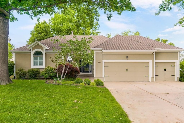 5408 W 153rd St, Leawood, KS 66224 - ranch-style home featuring concrete driveway, stucco siding, a garage, and a front lawn