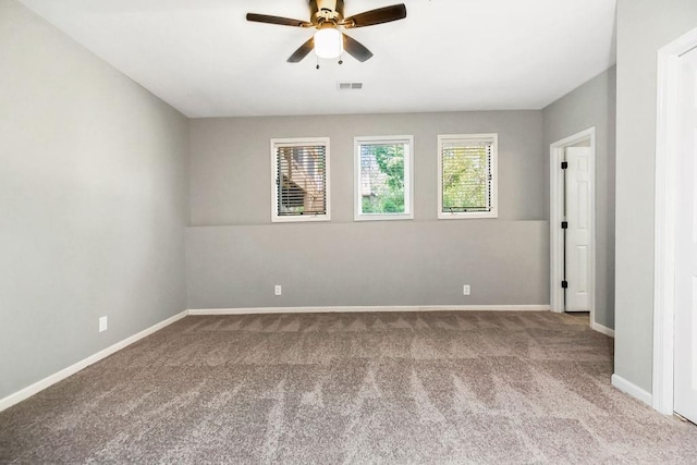 5408 W 153rd St, Leawood, KS 66224 - empty room with carpet floors, ceiling fan, and baseboards