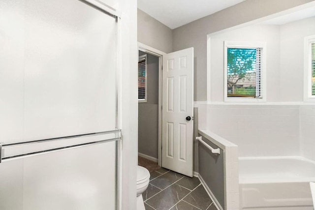 5408 W 153rd St, Leawood, KS 66224 - bathroom with a bath and toilet