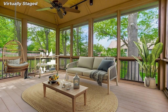 5408 W 153rd St, Leawood, KS 66224 - sunroom / solarium with ceiling fan and an outdoor living space
