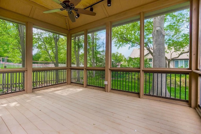 5408 W 153rd St, Leawood, KS 66224 - unfurnished sunroom with a ceiling fan